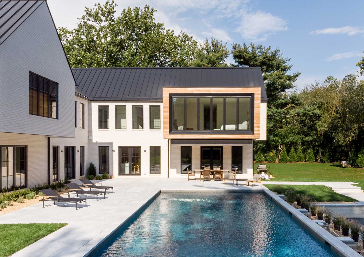 modern farmhouse white brick long island home design