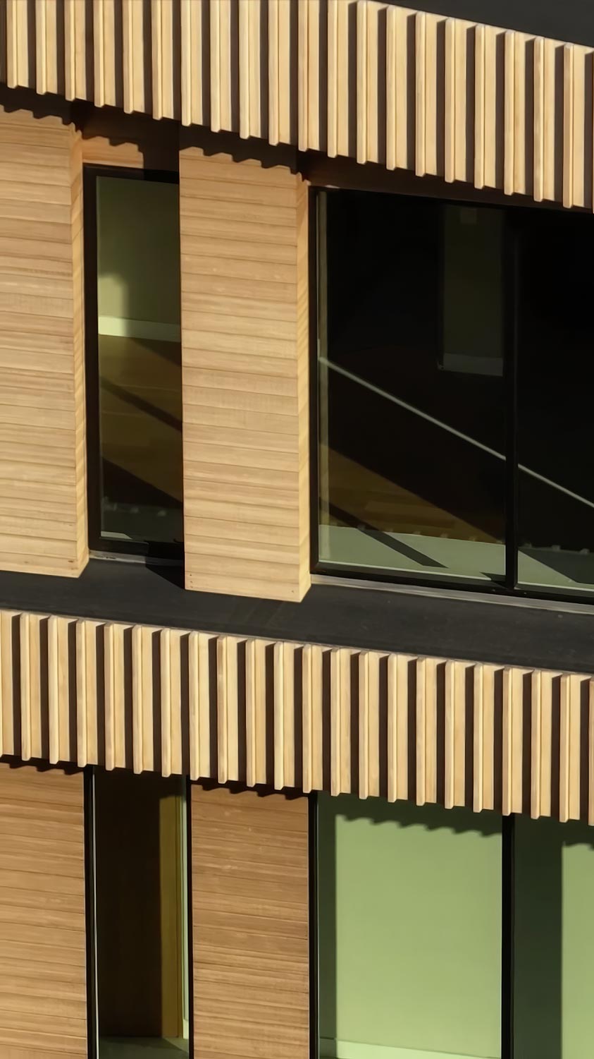 detail of light wood modern home architecture slats from drone