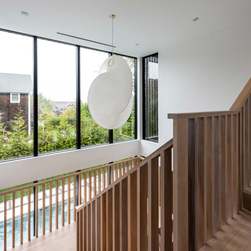 Architectural grade lighting fixtures in a modern home by The Up Studio.