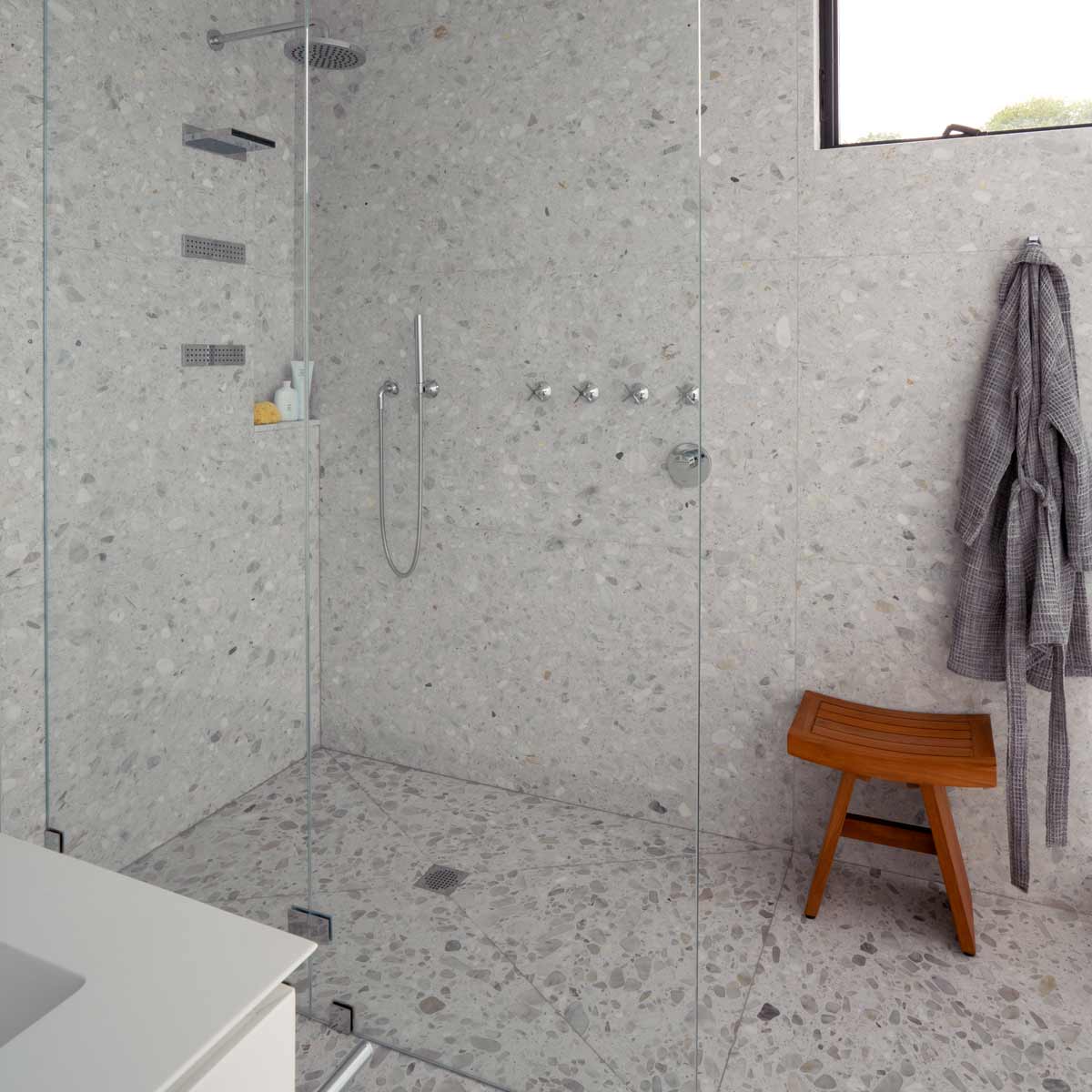 Curbless Shower in a modern home by The Up Studio.