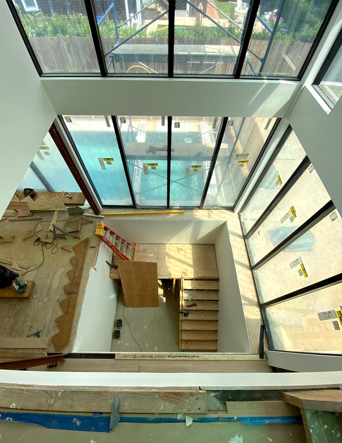 Sag Harbor Modern Home Architecture Construction on Stairwell Alongside Pool