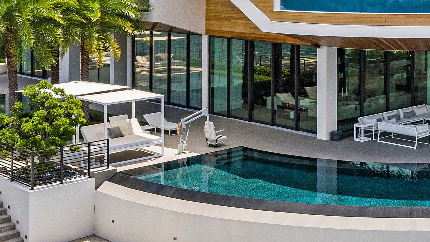 Modern Infinity Pool with Handicap Accessible Swing Arm