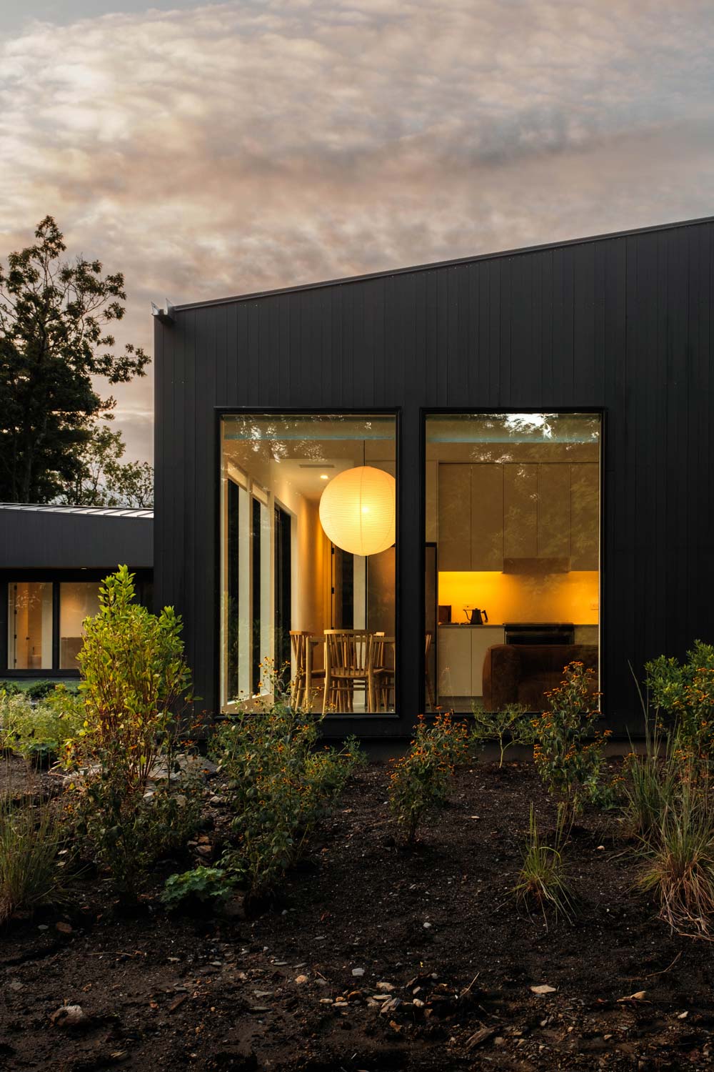 hudson valley black cedar gabeled roof modern home with mountain views