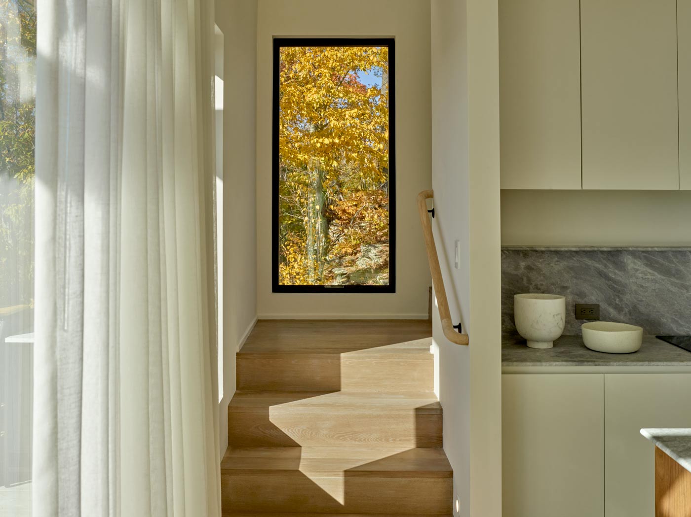 framed autumn foliage in hudson valley modern home design