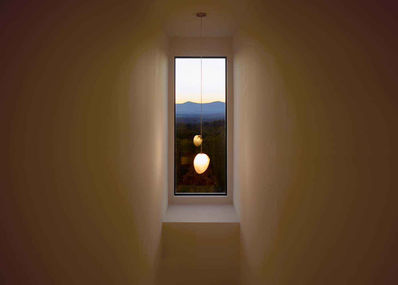 stairwell framed window in hudson valley modern house