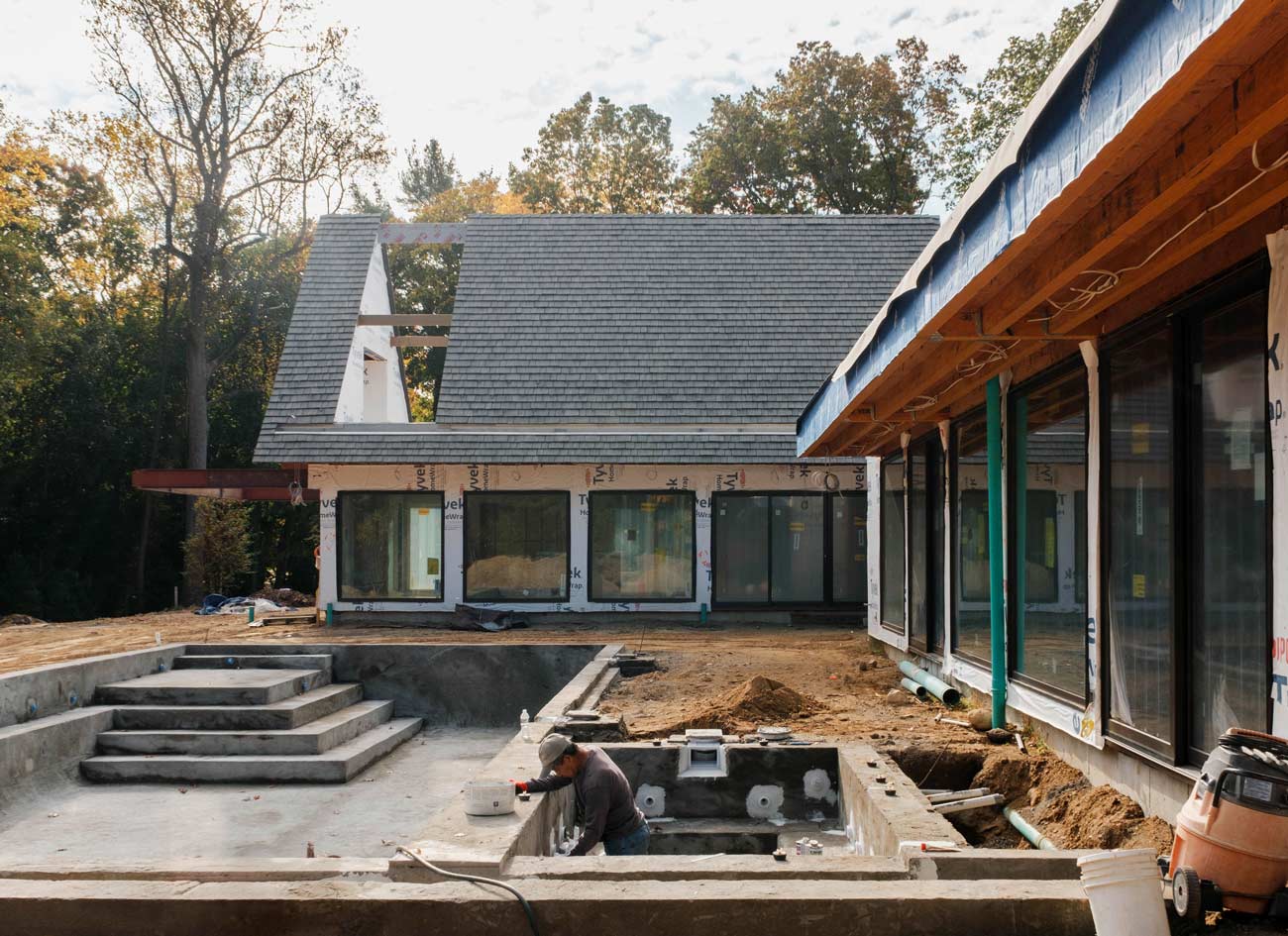 modern shingle style home design under construction in new york